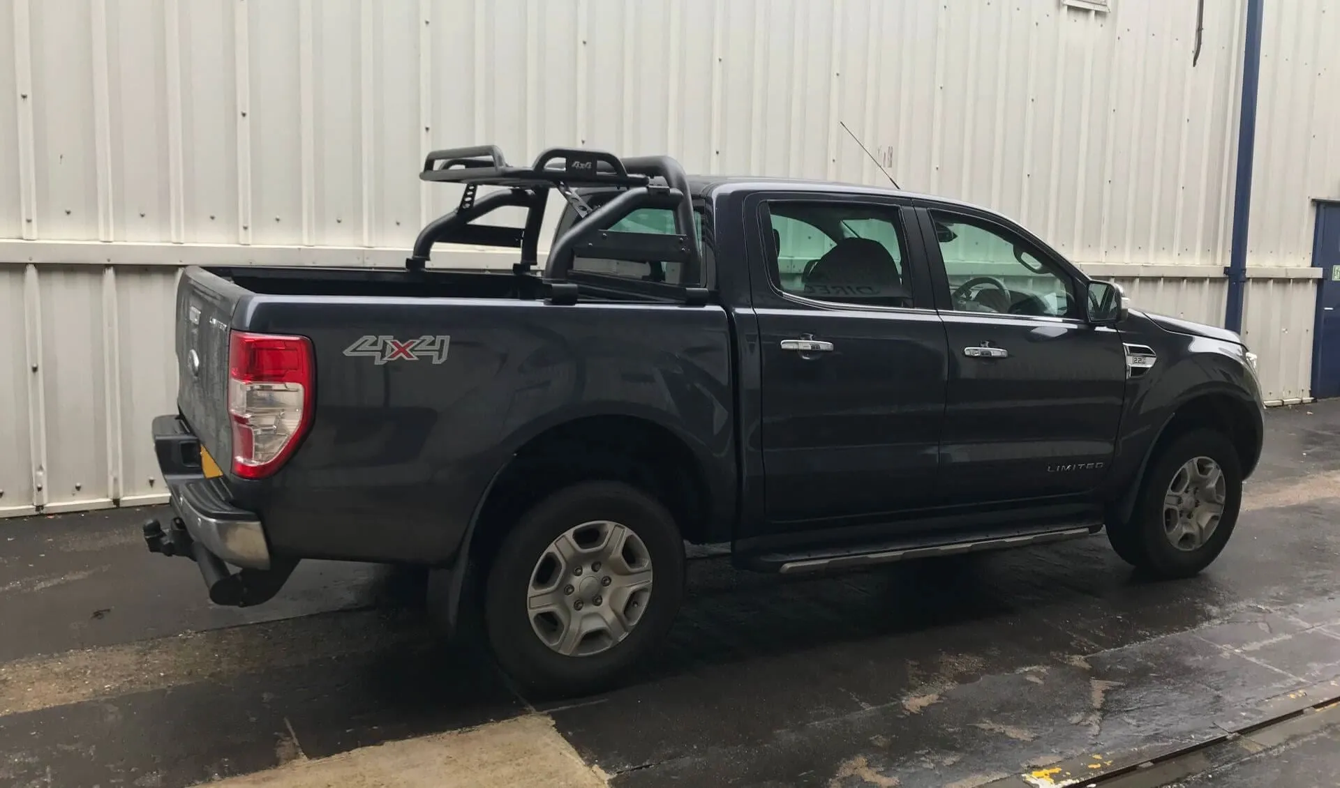 Black SUS201 Short Arm Roll Bar with Cargo Basket Rack for the Ford Ranger 2012 