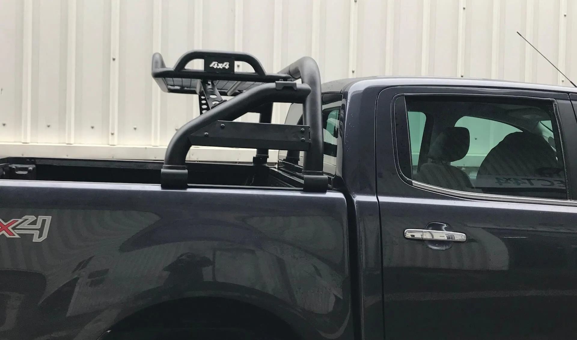 Black SUS201 Short Arm Roll Bar with Cargo Basket Rack for the Ford Ranger 2012 