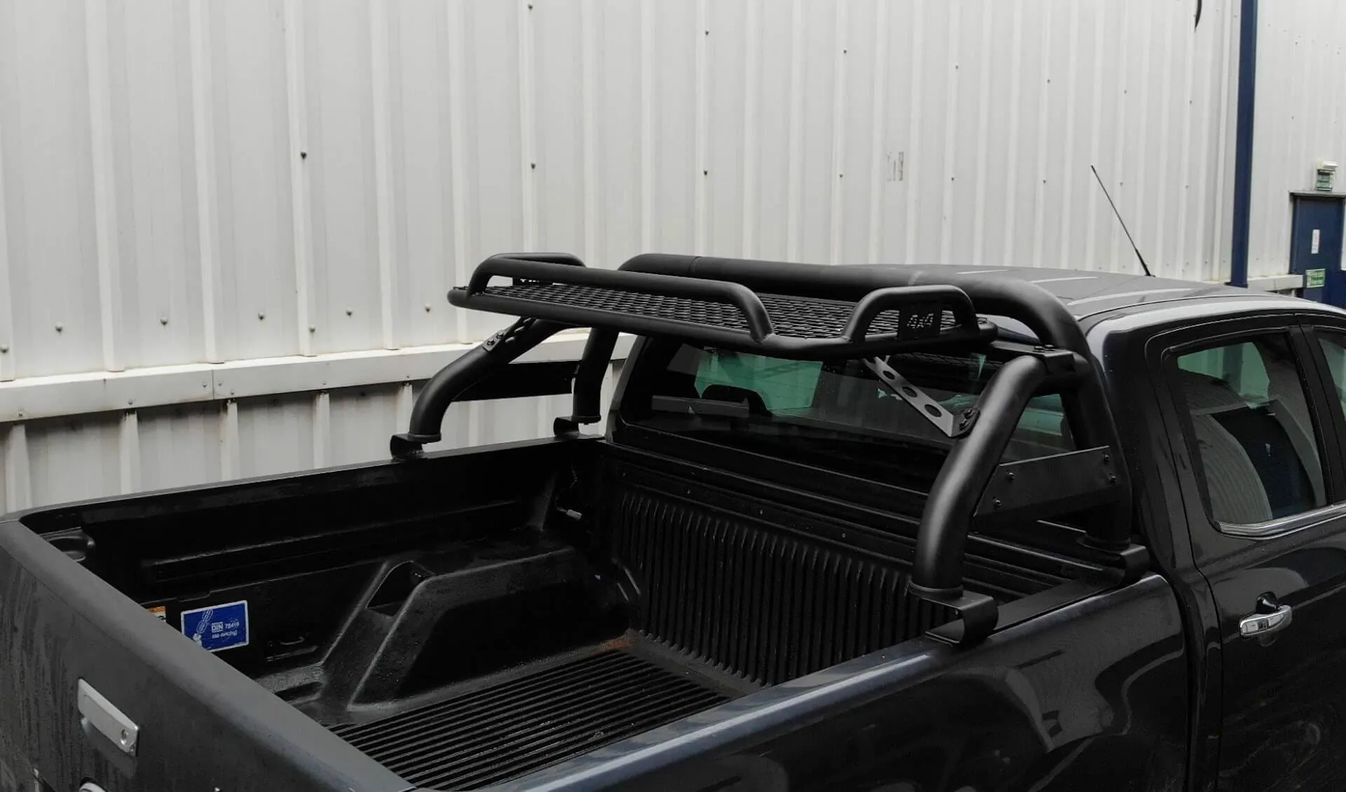 Black SUS201 Short Arm Roll Bar with Cargo Basket Rack for the Ford Ranger 2012 